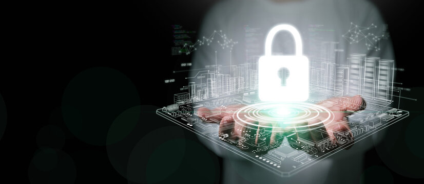 Cybersecurity concept. A man with both hands holding glowing padlock icon over digital circuit board with data servers for system protection, security, and safety on dark copy space background.