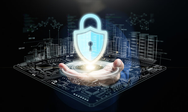 Cybersecurity concept. A man hand with glowing shield padlock icon over circuit board and server storage for system and data protection, security, privacy, and safety on dark background.