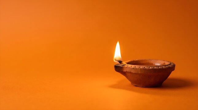 A radiant diya illuminates the spirit of diwali symbolizing the triumph of light over darkness and good over evil