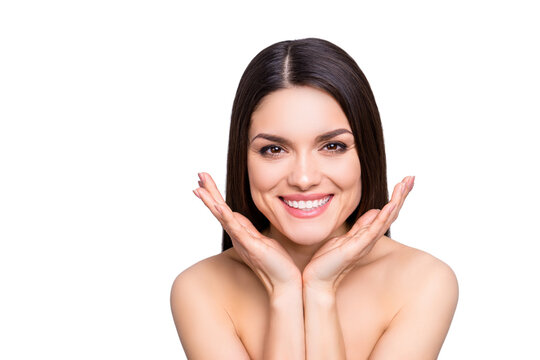 Portrait of gorgeous toothy woman presenting perfect smooth soft idyllic face skin isolated on grey background. Detox botox collagen vitamins minerals wellness wellbeing enhancement concept