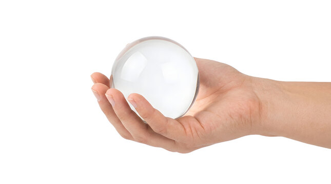 Crystal ball held in a hand for the concept of future prediction.