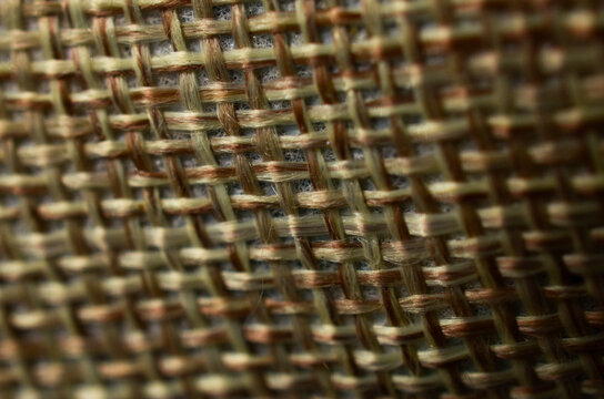 Coarse Woven Textile Macro with Interlaced Brown and Beige Fibers
