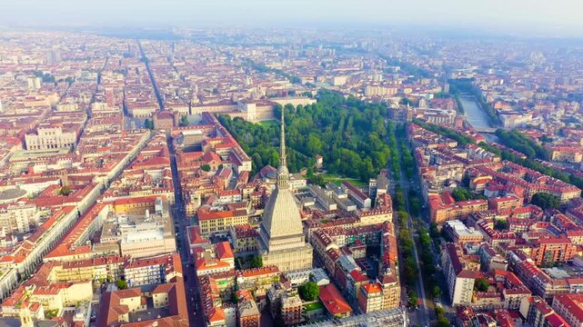 Turin, Italy. Flight over the city. Mole Antonelliana - a 19th-century building with a 121 m high dome and a spire. Drone footage, Point of interest