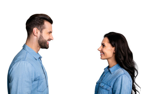 Lets talk. Profile side photo of cute positive beautiful students fellows staring speaking telling greeting having dialogue dressed in denim clothing isolated on argent background
