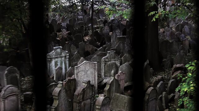 Old Jewish Cemetery Seen Through Barred Window In Prague Czech Republic - 4K