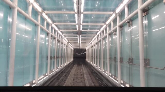 Washington Dulles International Airport, USA A moving AeroTrain between the terminals. 