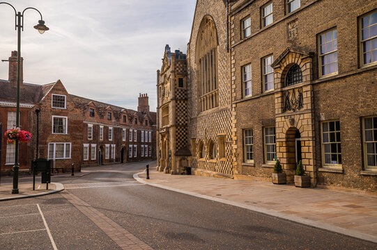 A view past the historic King's Lynn Town Hall towards Queens street in King's Lynn, Norfolk, England in summertime
