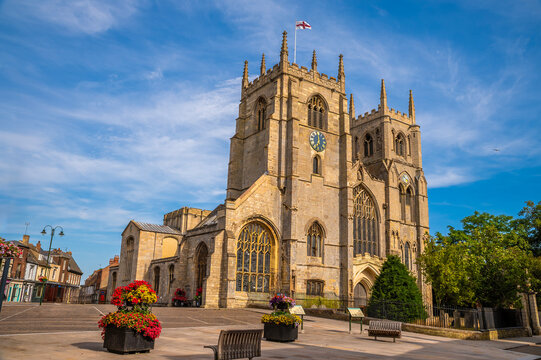 A view of King's Lynn Minster in Saturday Market Place in King's Lynn, Norfolk, England in summertime