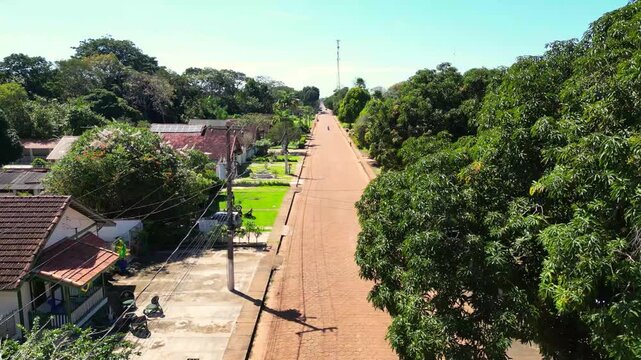 Aerial drone footage over Belterra, Par&aacute;, Brazil, a unique planned town established in the 1930s as part of an international rubber production project in the Amazon. The town preserves its distinctive