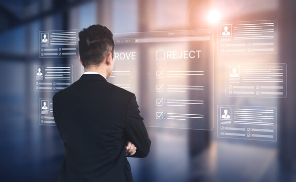Businessman Reviewing Digital Applications with Approve and Reject Options on Modern Transparent Display in Office Environment. Bitwise.