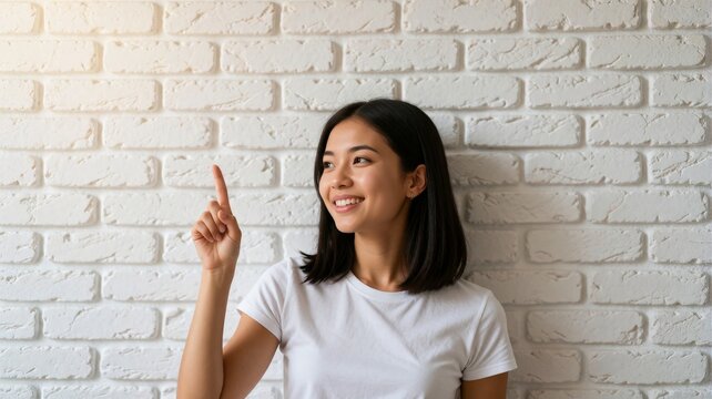 Asian Woman Smiling and Pointing Up