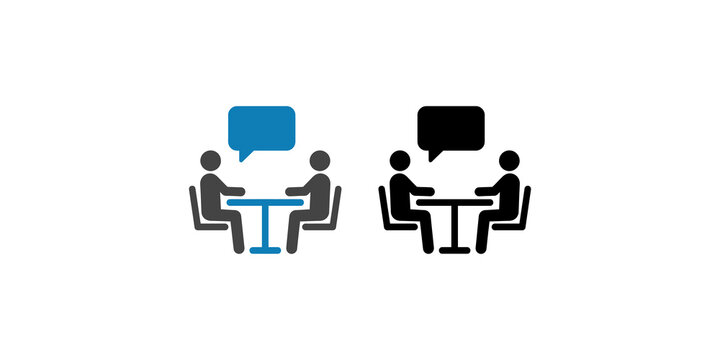 People discussing at round table with speech bubble icons for business communication.