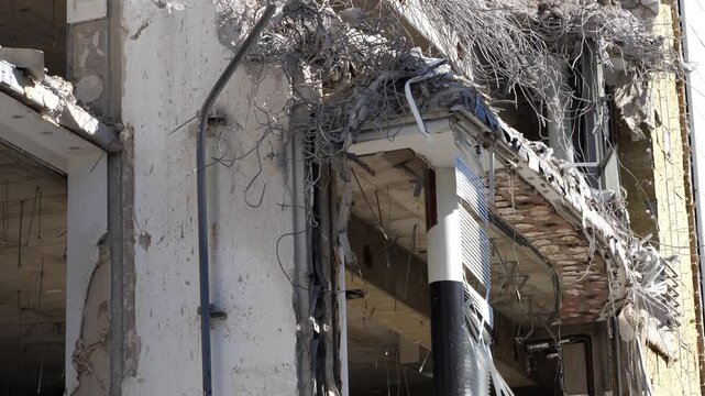 Close-Up of Damaged Concrete Structure and Exposed Rebar | Building Demolition Site and Structural Ruin