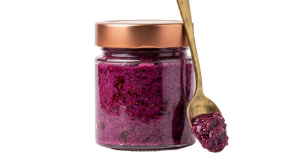 Glass jar filled with vibrant purple berry jam and a spoon with jam © Varvara