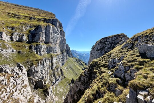 Dramatic alpine view between Hinterrugg and Ch&auml;serrugg in the Churfirsten, Switzerland, evoking mountain air, freedom, perspective and the challenge of heights.