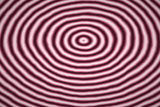 Maroon and pink concentric waves form soft feminine circular pattern for creative overlay