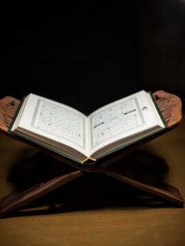 pages of holy koran the testament
