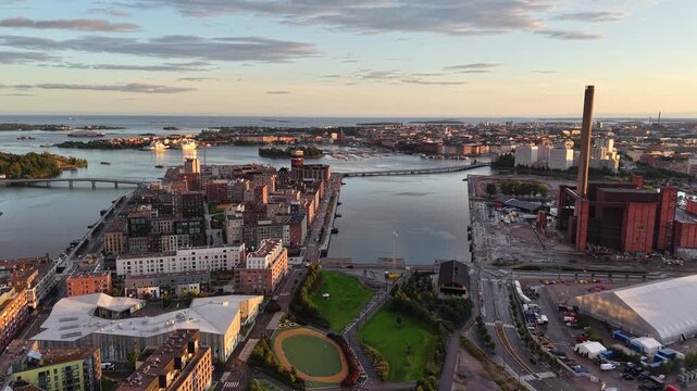 Aerial view of Helsinki cityscape during vibrant sunset, Finland