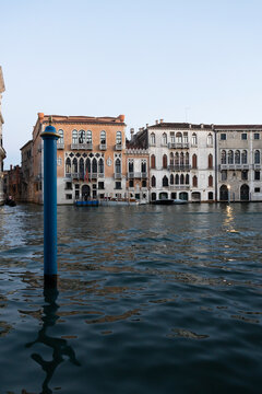 View of buildings on canal in Venice Italy