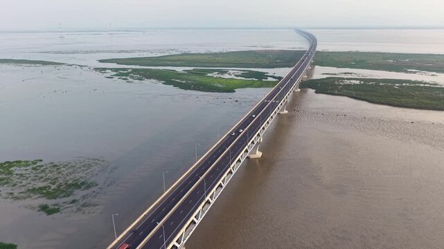 Aerial Drone View of Padma Multipurpose Bridge Crossing Padma River in Bangladesh