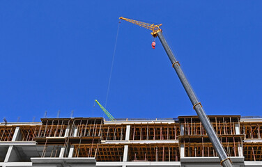 Boom of crane and construction © Unkas Photo