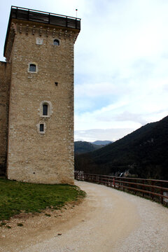 SPOLETO, ITALY - FEBRUARY 7, 2017: A defensive stone tower of Rocca Albornoziana. Perched on Sant'Elia Hill, overlooking the city, part of six defensive towers designed to project papal authority