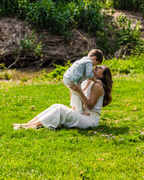 Mother and son sharing happy loving moment outdoors