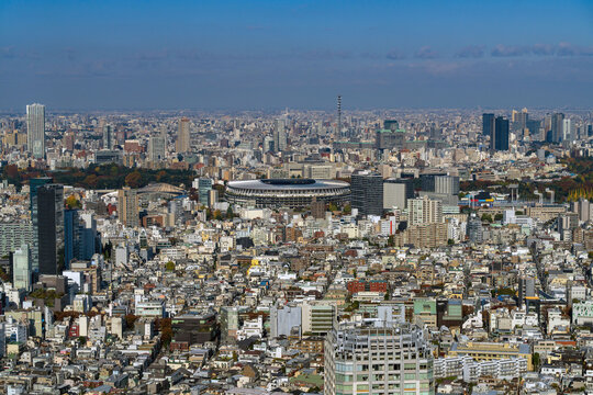 Expansive Tokyo cityscape featuring Japan National Stadium and surrounding Meiji Jingu Gaien area