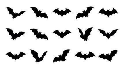 Fototapeta premium Set of black bat silhouettes in different flying positions for Halloween design.