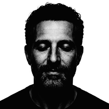 Serious man with pixelated face looking straight ahead illustration