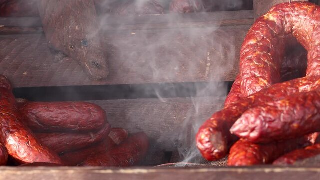 Traditional Smoked Venison Sausages with Smoke in Rustic Wooden Display