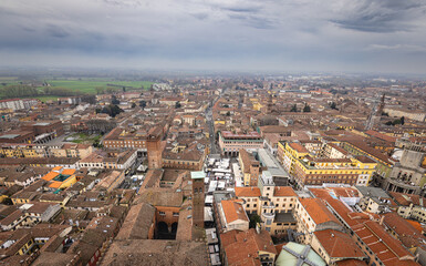 Fototapeta premium Cremona city overview with historic rooftops and market