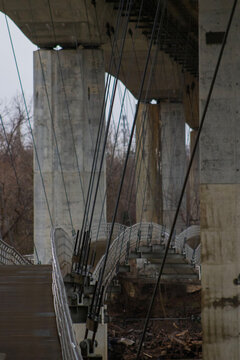 Cables and concrete pylons of a pedestrian suspension bridge Richmond