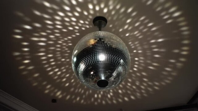 Disco ball turning with moving lights