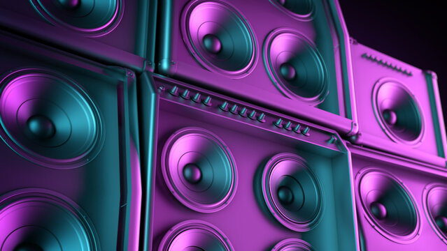Speakers arranged in stacked rows with visible knobs, illuminated by purple and teal lighting in a close-up view.