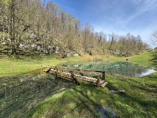 Fototapeta premium Schmidt lake (Green Lake) or Smit’s Lake in Donje Zagorje - Ogulin, Croatia (Šmitovo jezero ili Zeleno jezero kod Donjeg Zagorja - Ogulin, Hrvatska)
