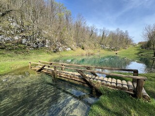 Fototapeta premium Schmidt lake (Green Lake) or Smit’s Lake in Donje Zagorje - Ogulin, Croatia (Šmitovo jezero ili Zeleno jezero kod Donjeg Zagorja - Ogulin, Hrvatska)