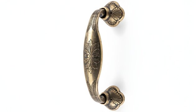 Door handle made of vintage ornate bronze featuring decorative filigree carvings lies isolated on a solid white surface.