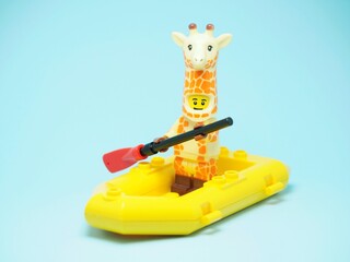Fototapeta premium Indonesia - October 3, 2023 : Mini toy of action figure at table with blurred background.