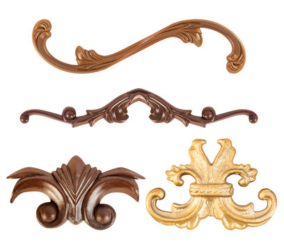 Isolated photo of plastic colored ornate classical baroque decorative element set on white background.
