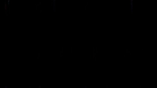 Black background features faint vertical texture lines across the dark surface.