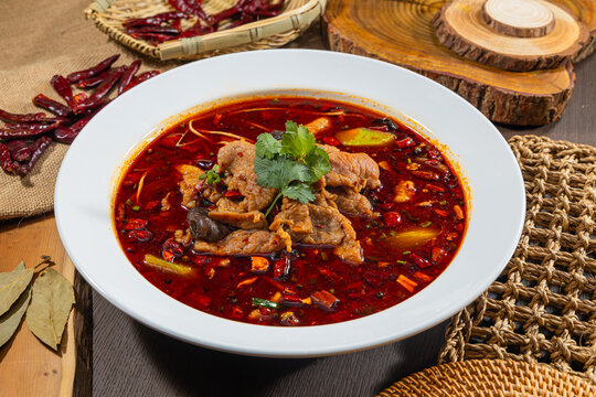 Sichuan spicy beef in red broth bowl