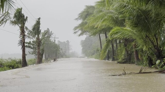 Flood Waters Flow Across Rural Highway In Aftermath Of Hurricane Heavy Rain