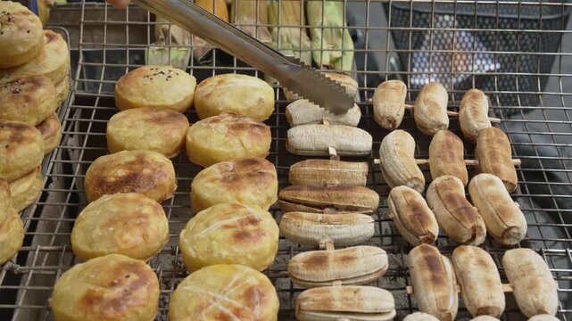 Grill banana and potatoes in the street