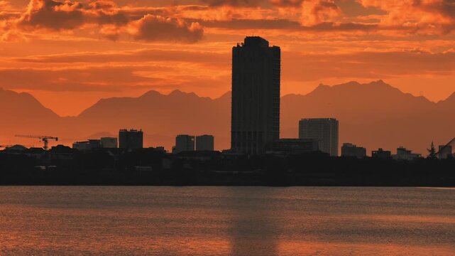 Panorama of City Skyline With building silhouettes at Sunset