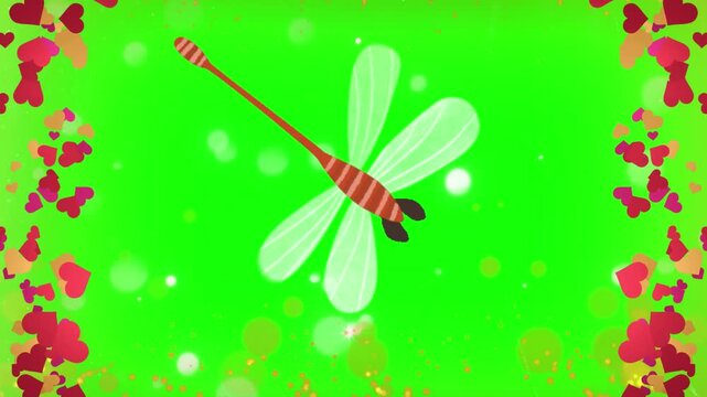Dragonfly graphic centered on a vibrant green background featuring floating heart borders and gentle bokeh particles creating a whimsical and charming digital motion animation effect.