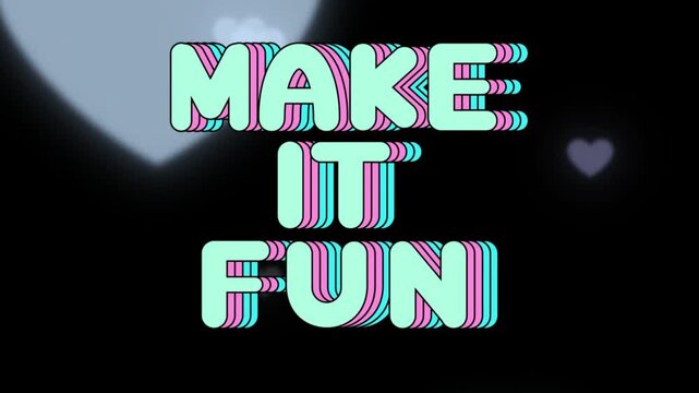 Make it fun typography stands out in bold retro stacked letters against a dark background featuring soft glowing heart bokeh elements.