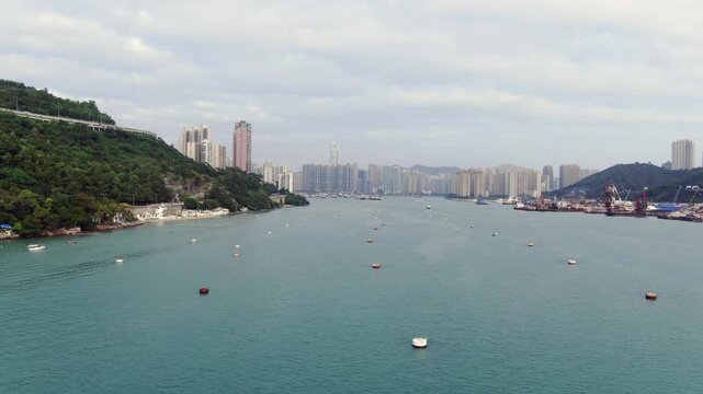 Aerial view of Rambler Channel and Tsing Yi island residential skyline in Hong Kong.
