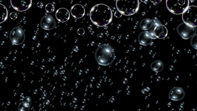 Many translucent spheres float and descend against a dark background with overall mood serene dreamlike sense gentle motion wonder