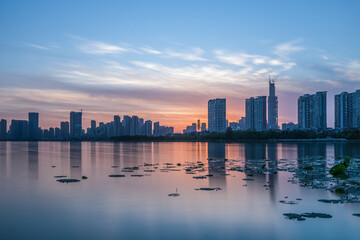 Wuhan Skyline Sunset Over Wetland, Urban Evening Cityscape © QuachVan